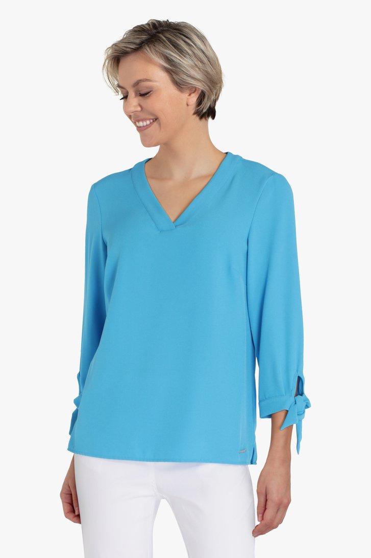 Blauwe blouse met V-hals