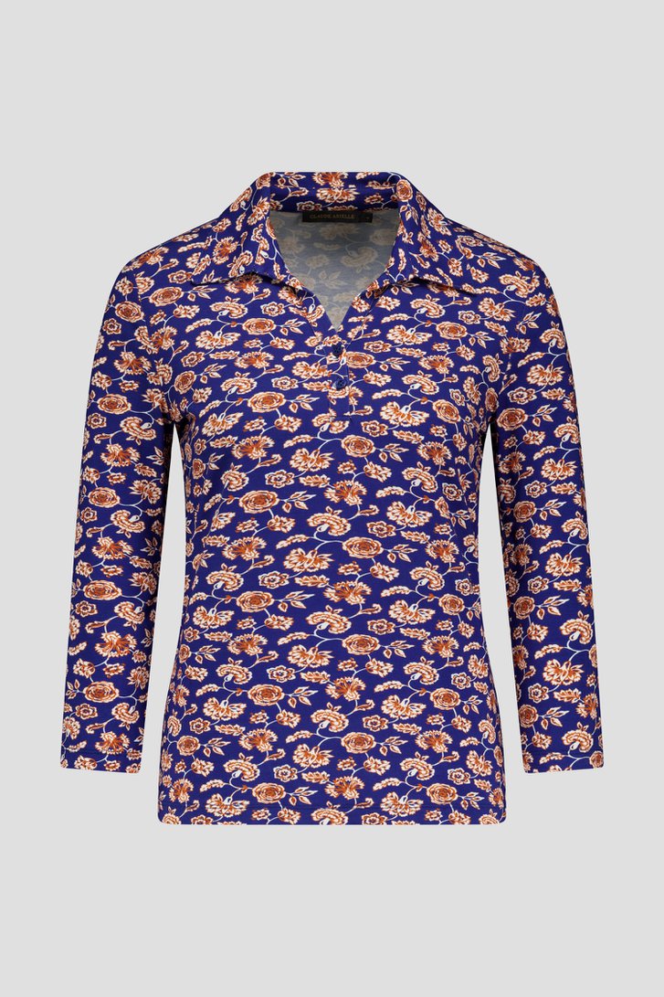 Blauwe polo met oranje bloemen van Claude Arielle voor Dames