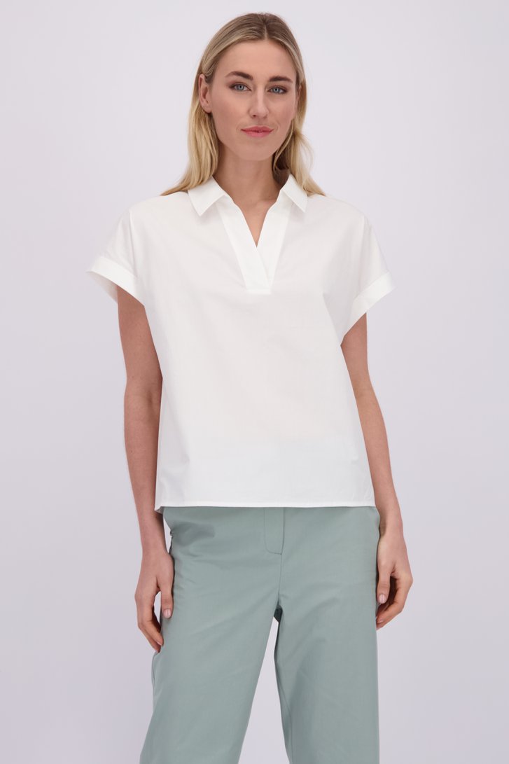 Le devant de Blouse blanche à col en V de Liberty Island pour Femmes