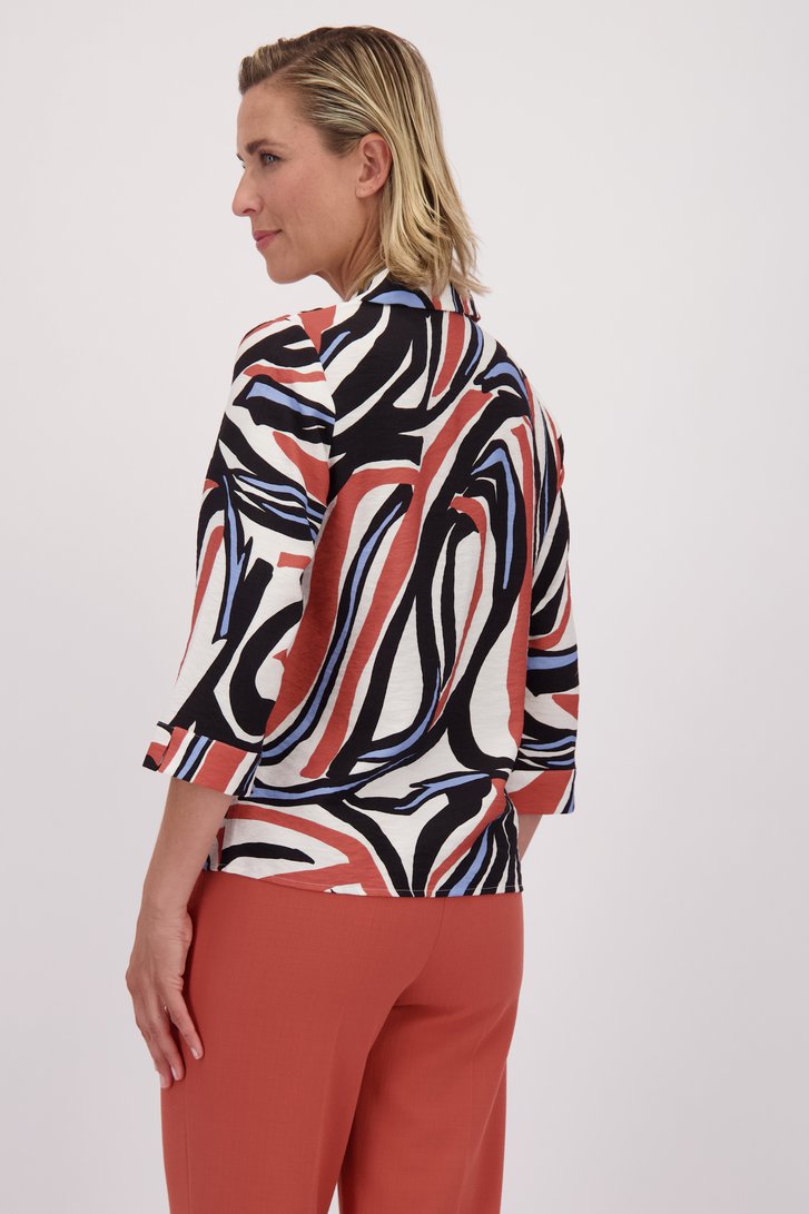 Le dos de Blouse écrue à imprimé graphique orange de Claude Arielle pour Femmes