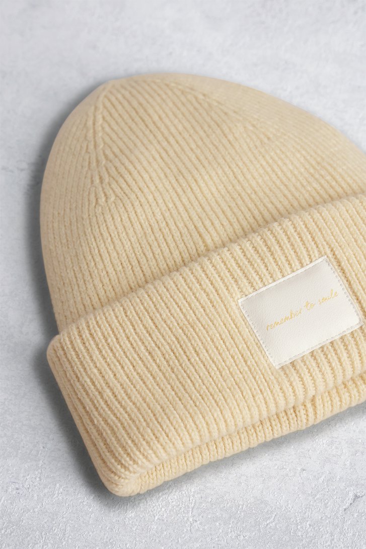 Photo produit 1 de Bonnet tricoté beige à inscription dorée de Liberty Island pour Femmes