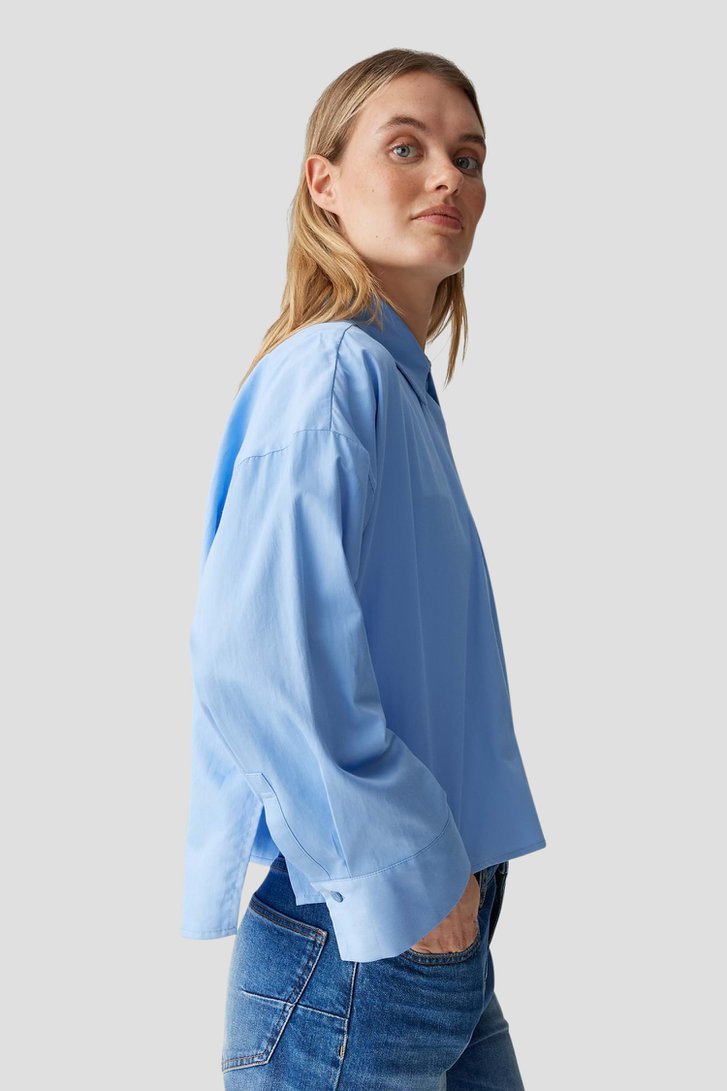 Detail van Lichtblauwe blouse  door Opus voor Dames