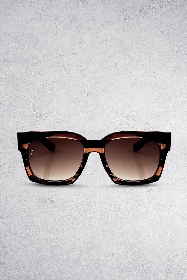 Le devant de Lunettes de soleil rectangulaires brunes – Alba de Otra pour Femmes
