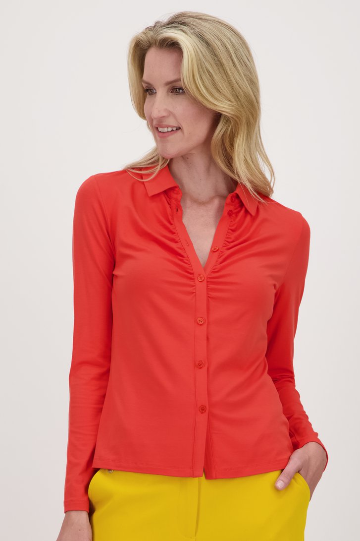 Polo à manches longues orange de Claude Arielle pour Femmes