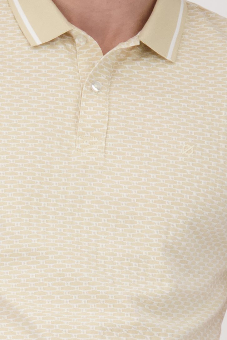 Polo beige à motif blanc de Ravøtt pour Hommes