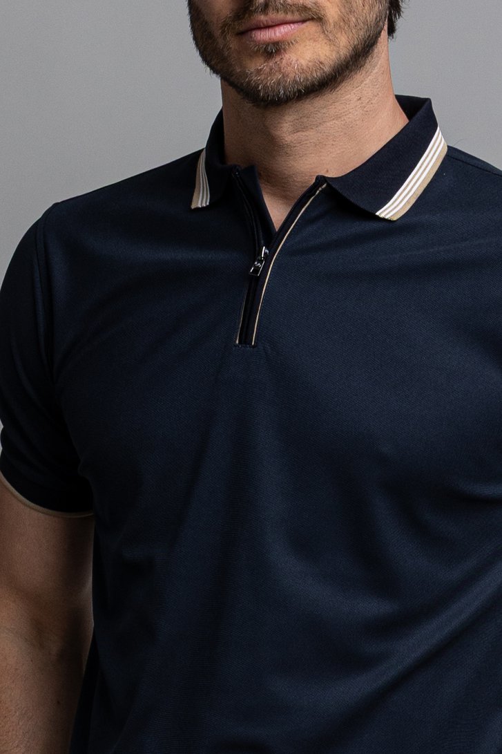 Détail de Polo de golf bleu avec fermeture zippée courte de Dansaert Golf Club pour Hommes