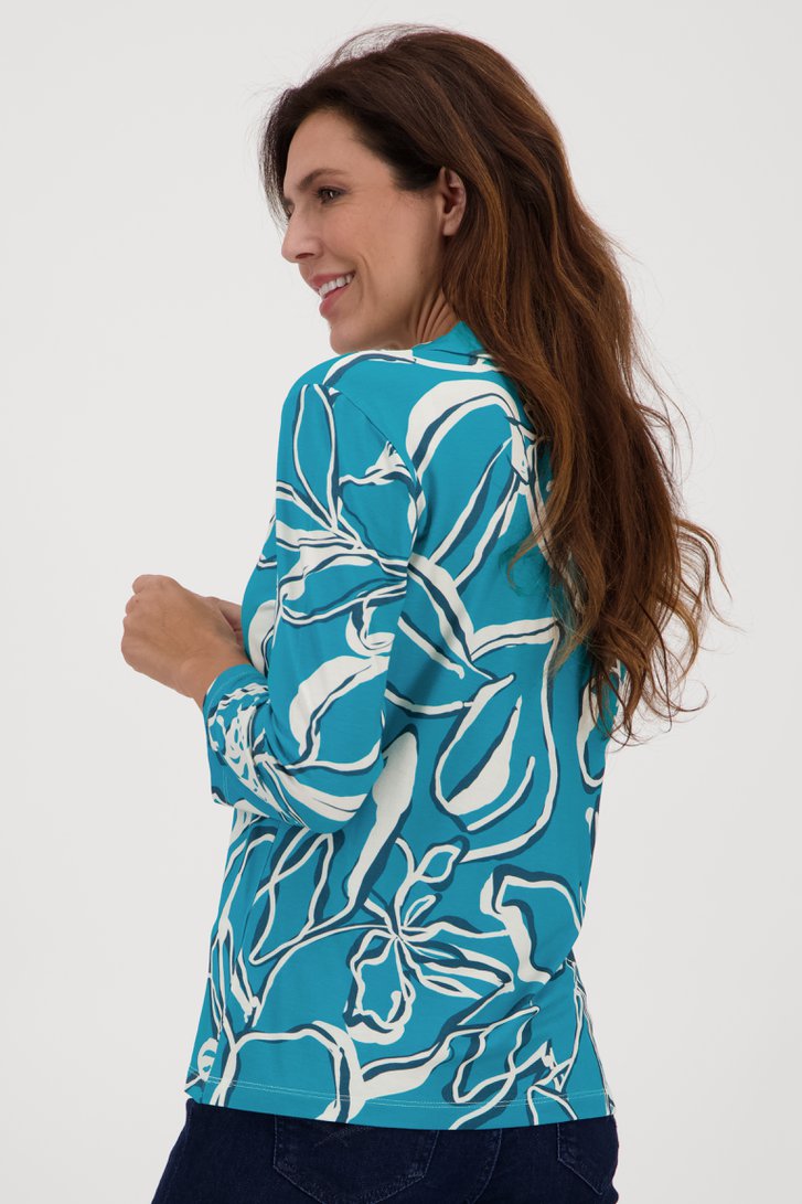 Polo turquoise avec imprimé écru de Claude Arielle pour Femmes