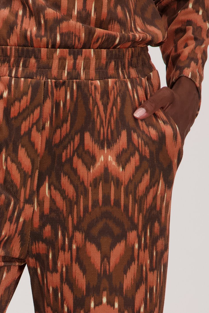 Wijde broek met oranje-bruine print van Louise voor Dames