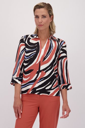 Le devant de Blouse écrue à imprimé graphique orange de Claude Arielle pour Femmes