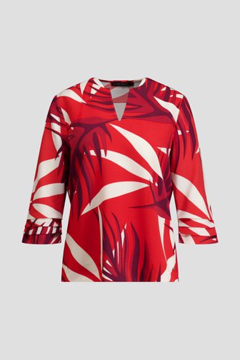 Le devant de Blouse rouge à motif feuillu de Claude Arielle pour Femmes