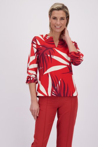 Le devant de Blouse rouge à motif feuillu de Claude Arielle pour Femmes