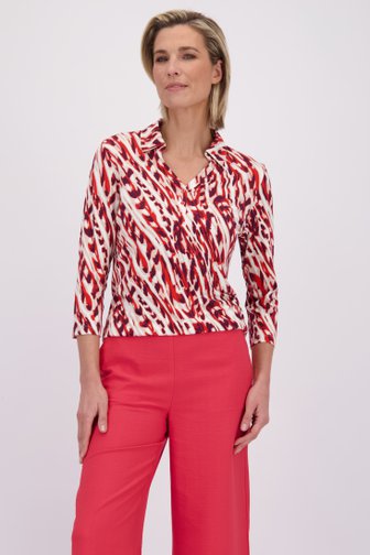 Voorkant van Bordeaux-rode polo met abstracte print  door Claude Arielle voor Dames