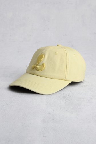 Le devant de Casquette jaune à effet délavé de Louise pour Femmes
