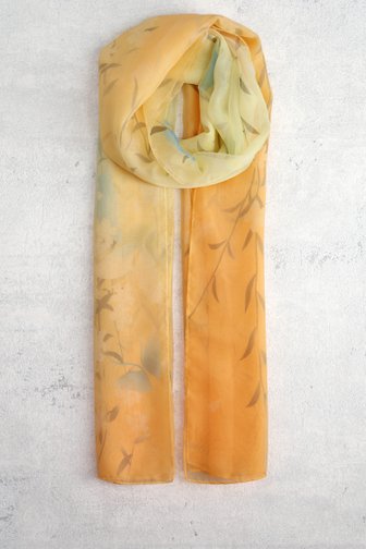 Le devant de Foulard dégradé jaune-orangé avec imprimé feuilles de Modeno pour Femmes