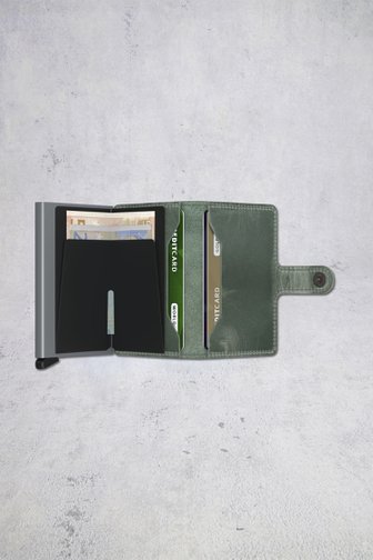 Voorkant van Groene lederen kaarthouder - Miniwallet vintage door Secri voor Heren