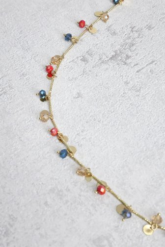 Voorkant van Lange goudkleurige ketting met gekleurde kralen. door Liberty Island voor Dames