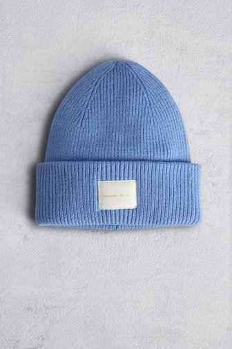 Voorkant van Lichtblauwe gebreide muts met gouden opschrift door Liberty Island voor Dames