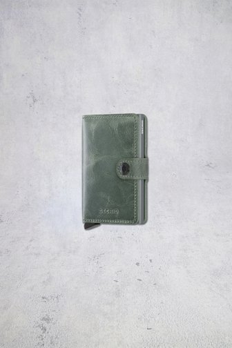 Le devant de Porte-cartes en cuir vert à l’aspect vintage de Secri pour Hommes