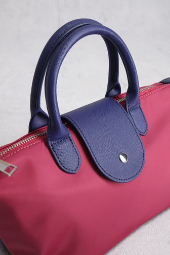 Productfoto 1 van Roze handtas met paarse leather look afwerking door Liberty Island voor Dames