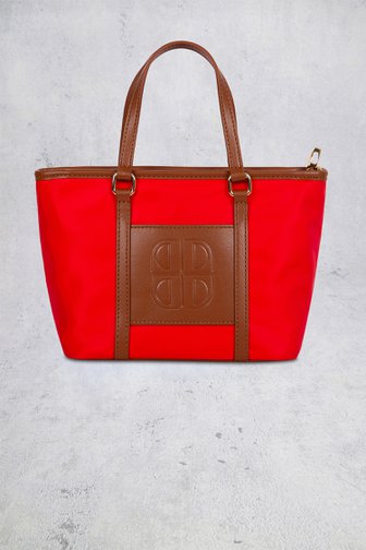Le devant de Sac porté épaule rouge avec détails bruns  de Laurent David pour Femmes