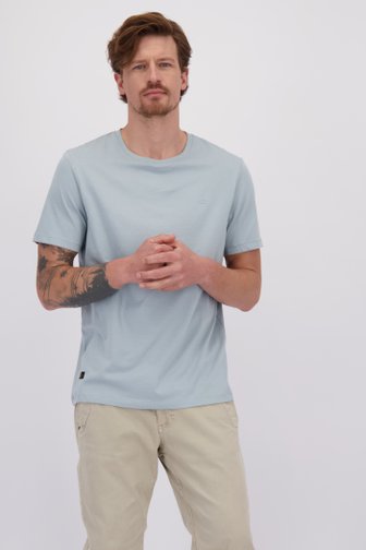 Le devant de T-shirt turquoise à manches courtes de Camel active pour Hommes