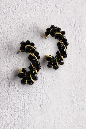 Voorkant van Zwart-gouden gedraaide oorringen door Liberty Island voor Dames