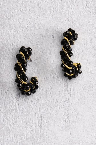 Voorkant van Zwart-gouden gedraaide oorringen door Liberty Island voor Dames