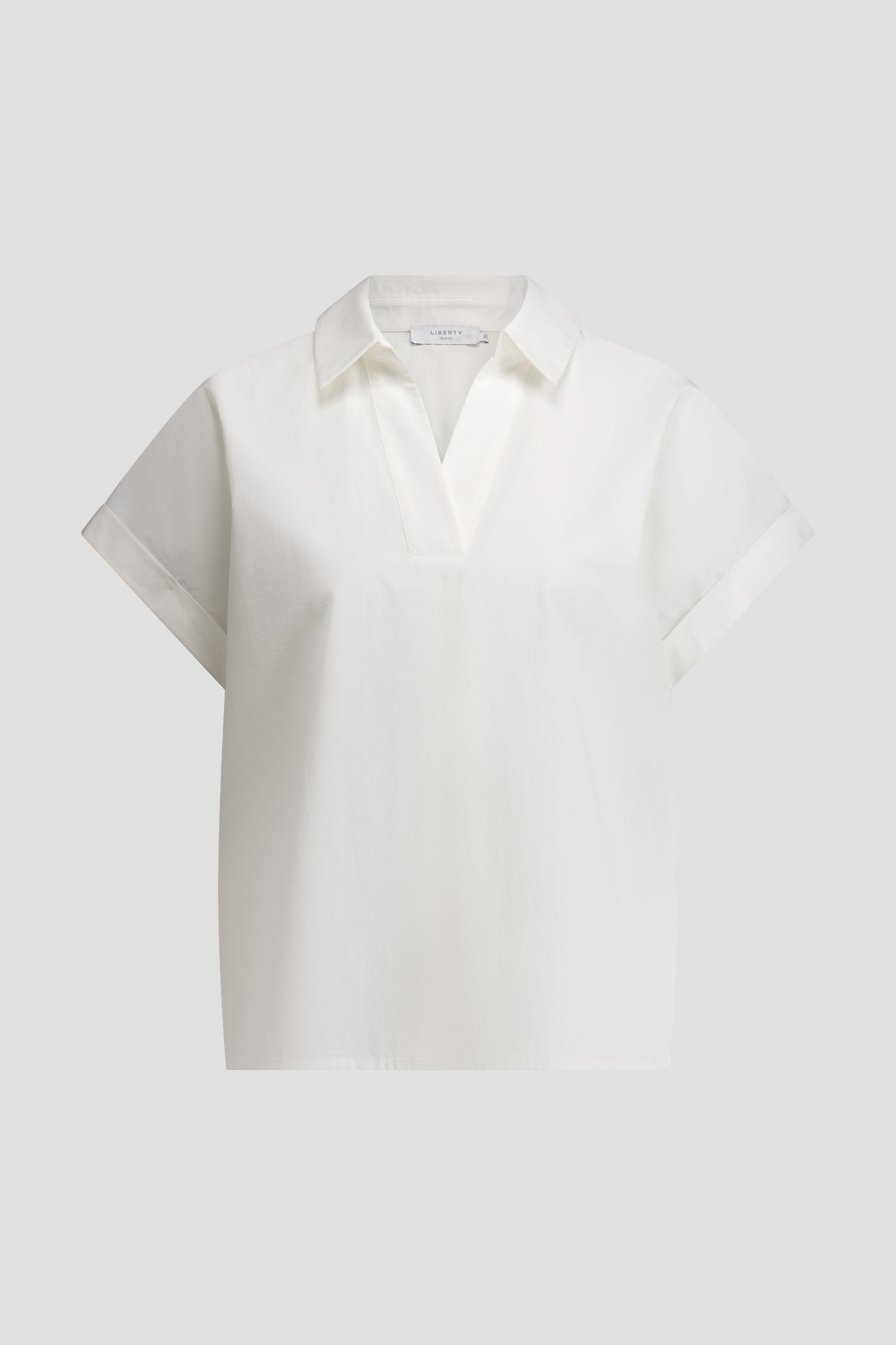 Photo produit 1 de Blouse blanche à col en V de Liberty Island pour Femmes