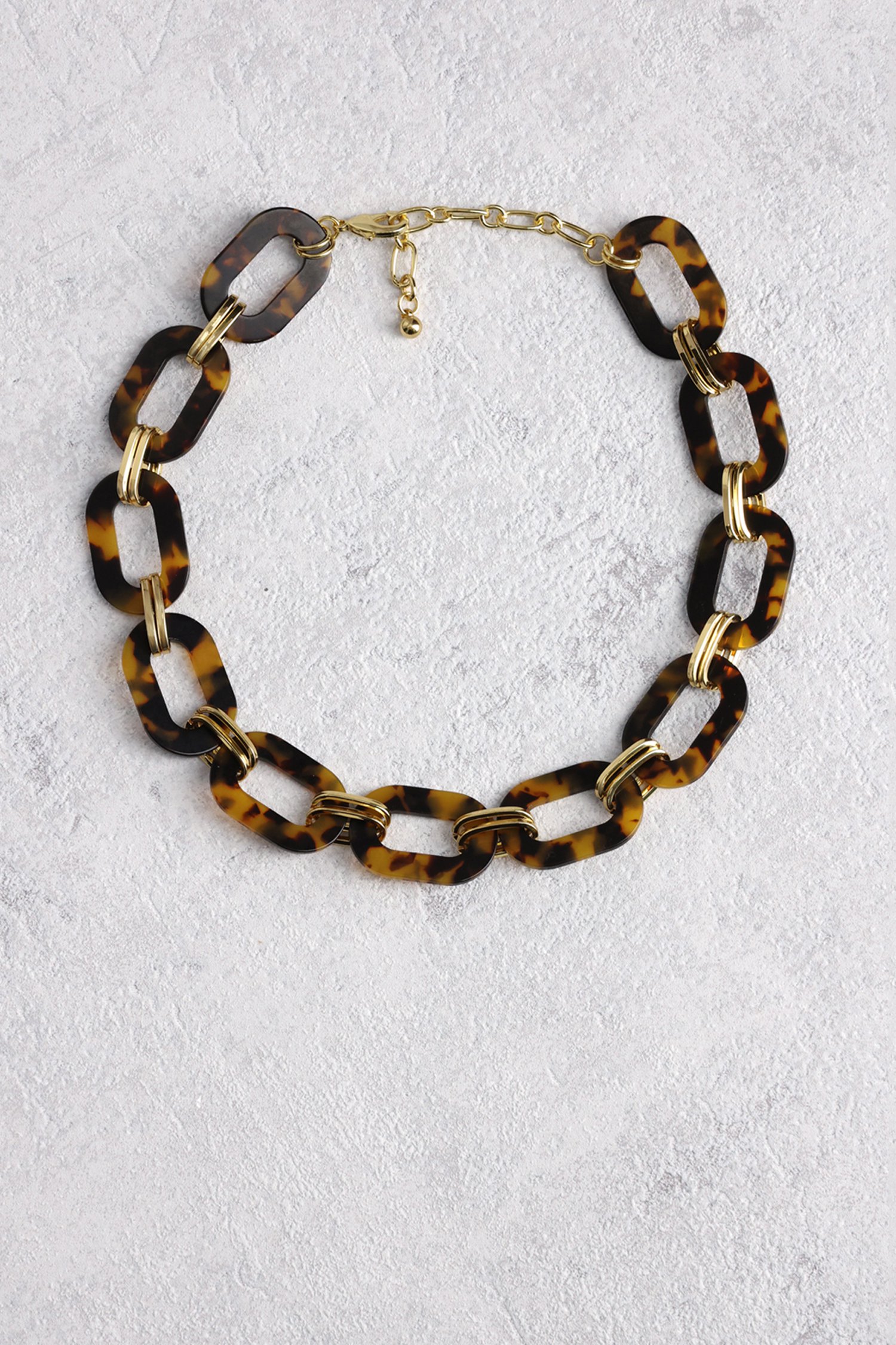 Voorkant van Goudkleurige ketting met bruine schakels door Liberty Island voor Dames