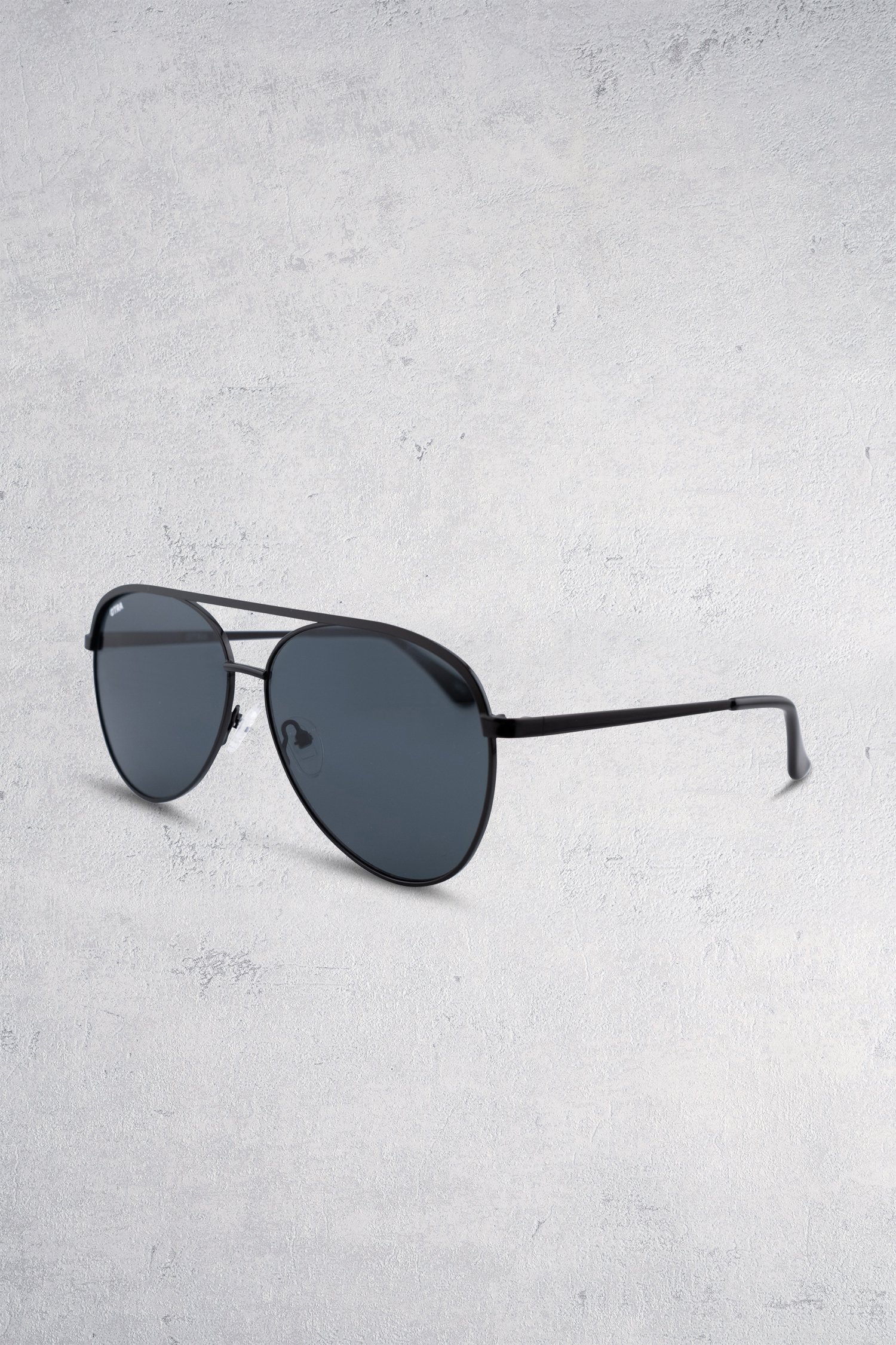 Le dos de Lunettes de soleil aviateur noires – Charlie de Otra pour Femmes