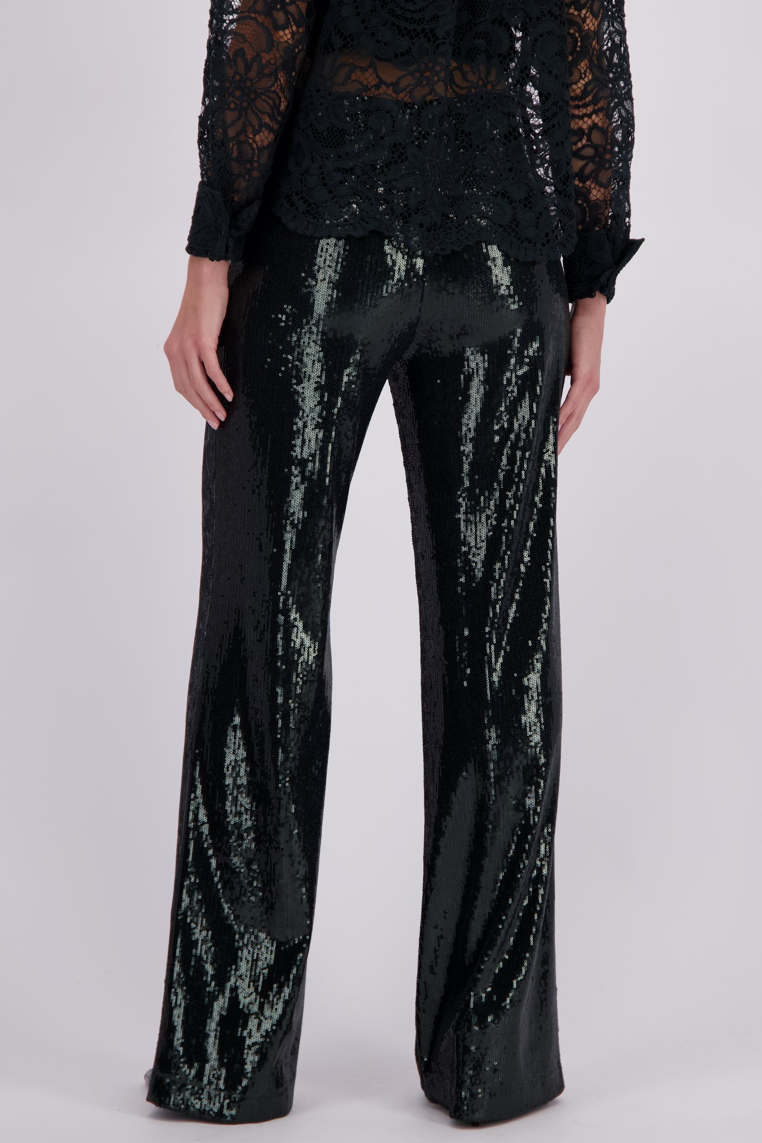 Le dos de Pantalon vert foncé à paillettes évasé de D'Auvry pour Femmes