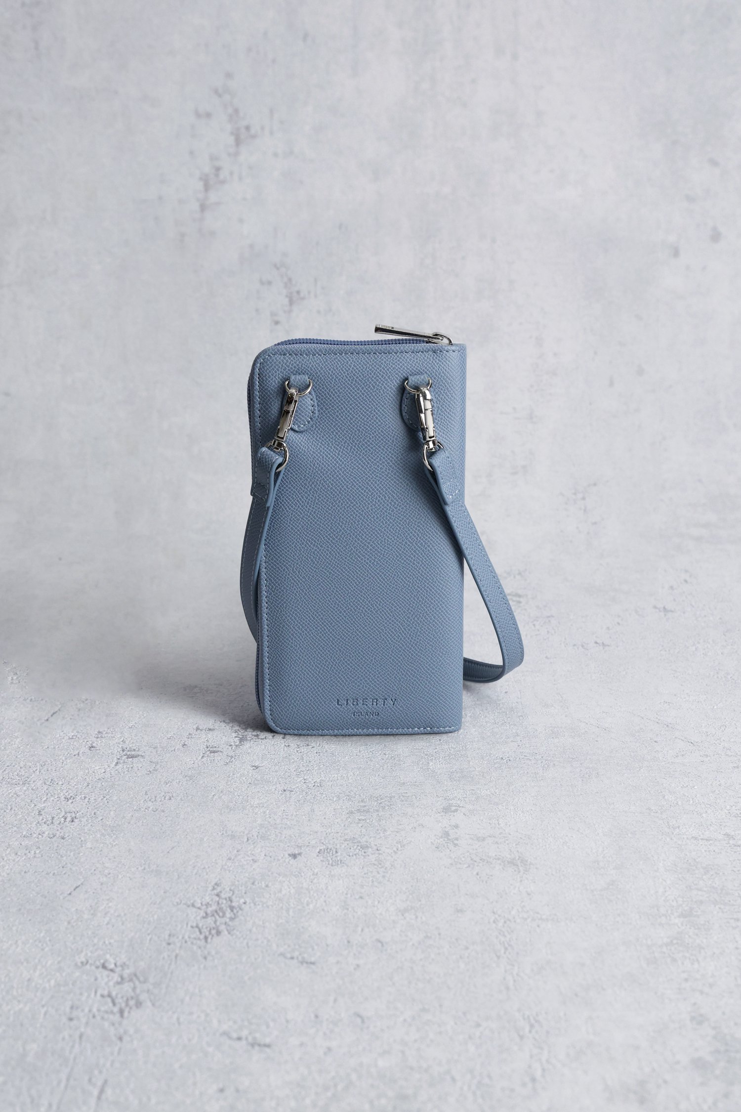 Le dos de Pochette téléphone bleue avec portefeuille de Liberty Island pour Femmes