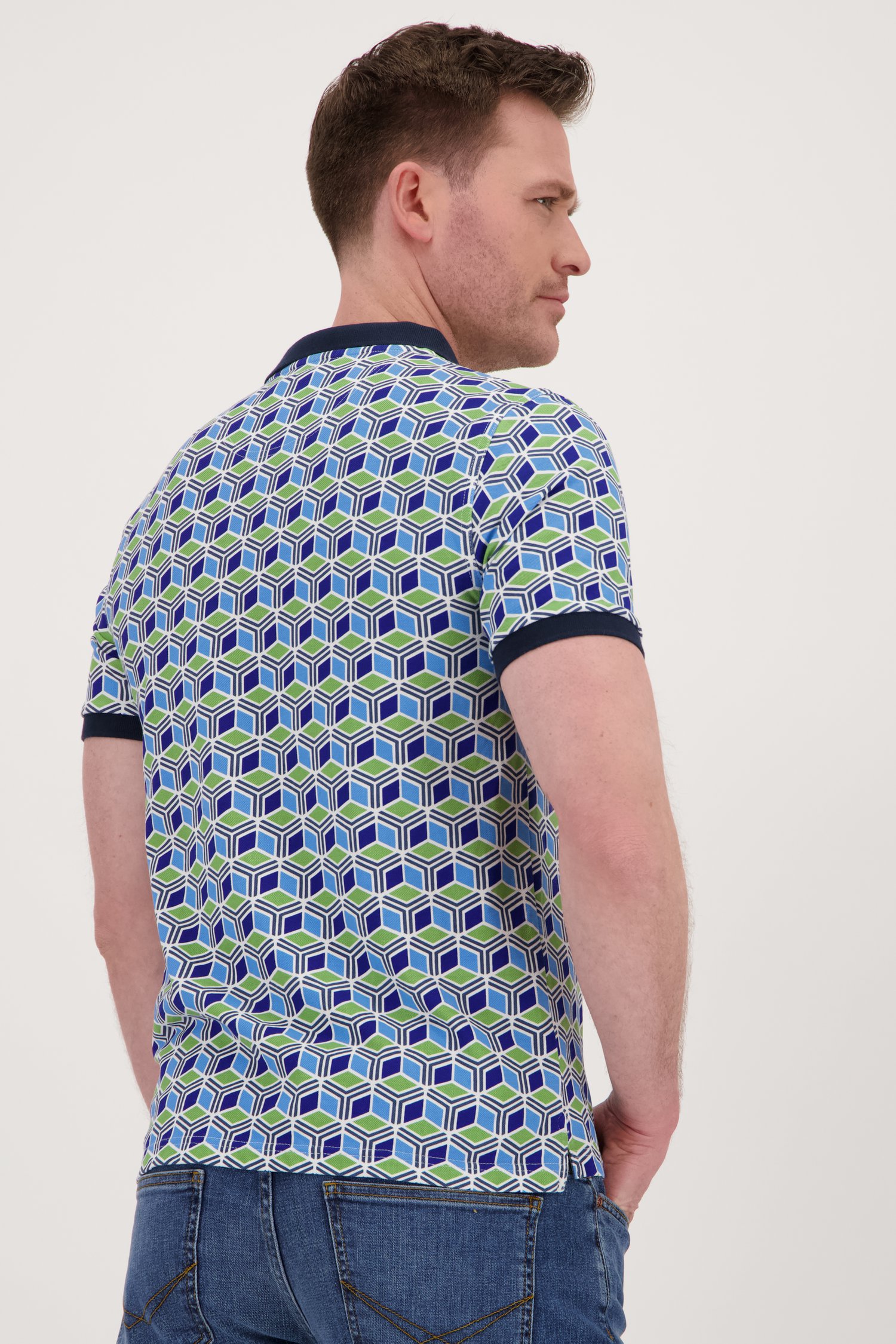 Polo à motif graphique vert-bleu de Ravøtt pour Hommes
