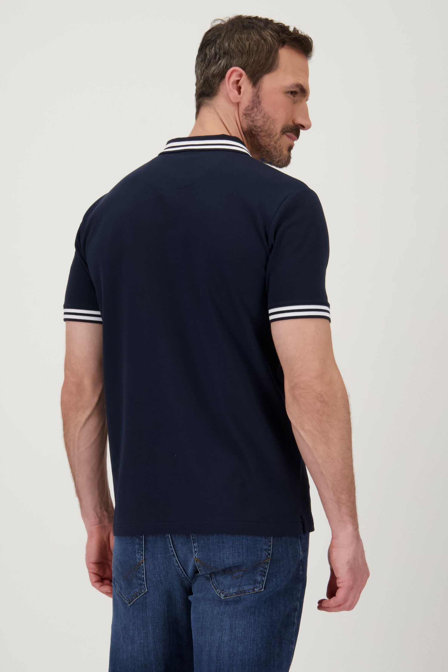 Polo bleu à fermeture éclair et rayures blanches de Upper East pour Hommes
