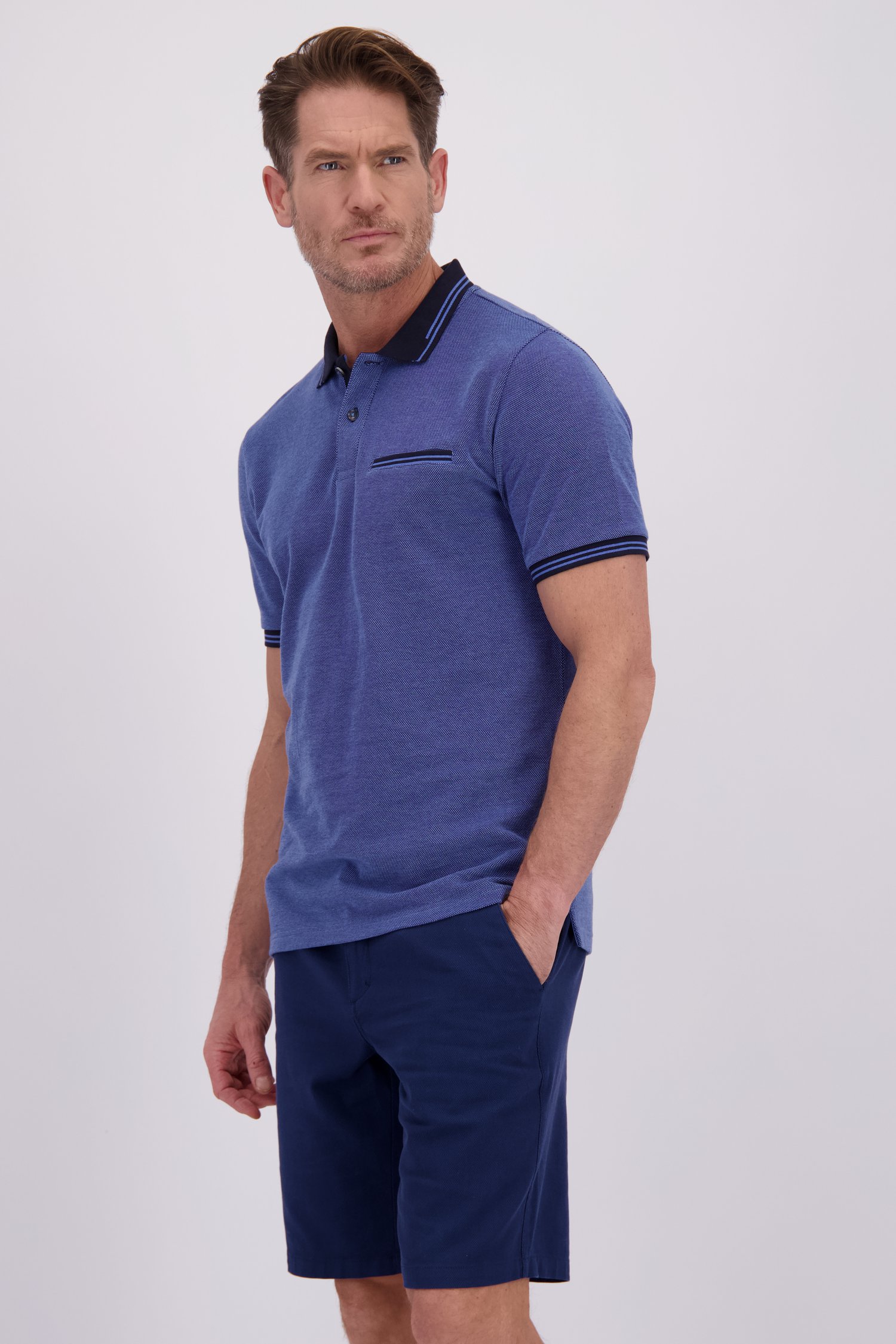 Le devant de Polo bleu chiné de Dansaert Blue pour Hommes