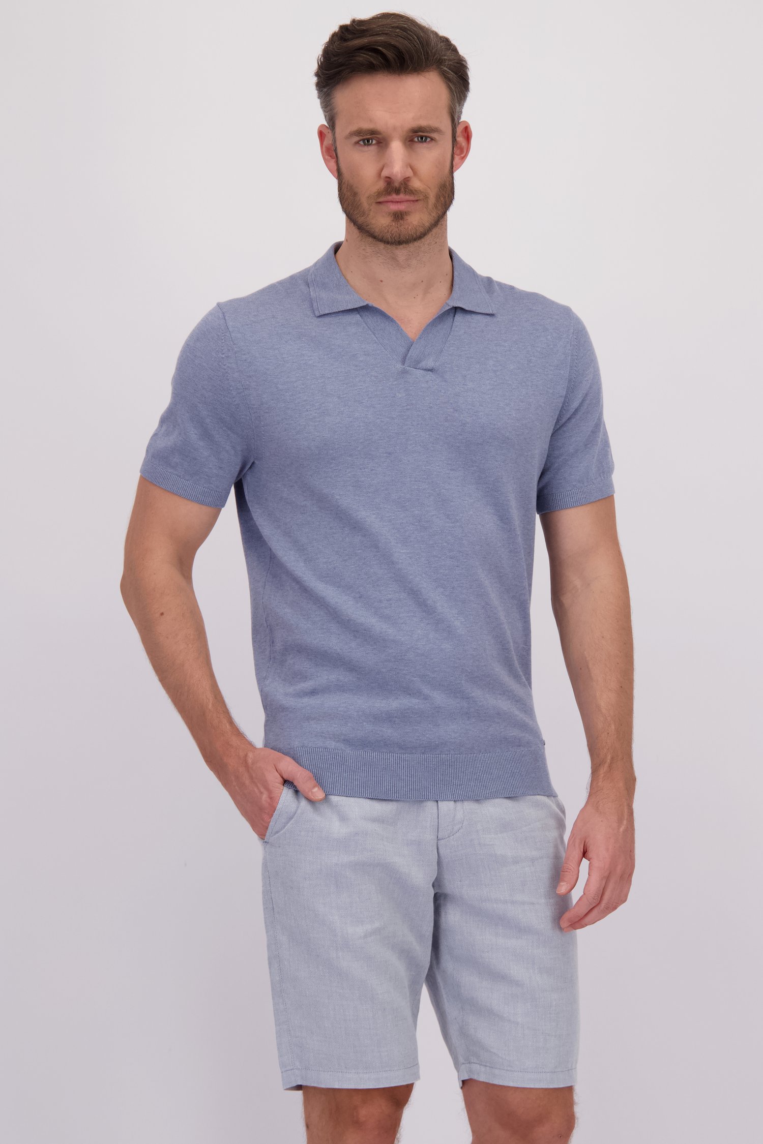 Le devant de Polo bleu clair chiné de Upper East pour Hommes