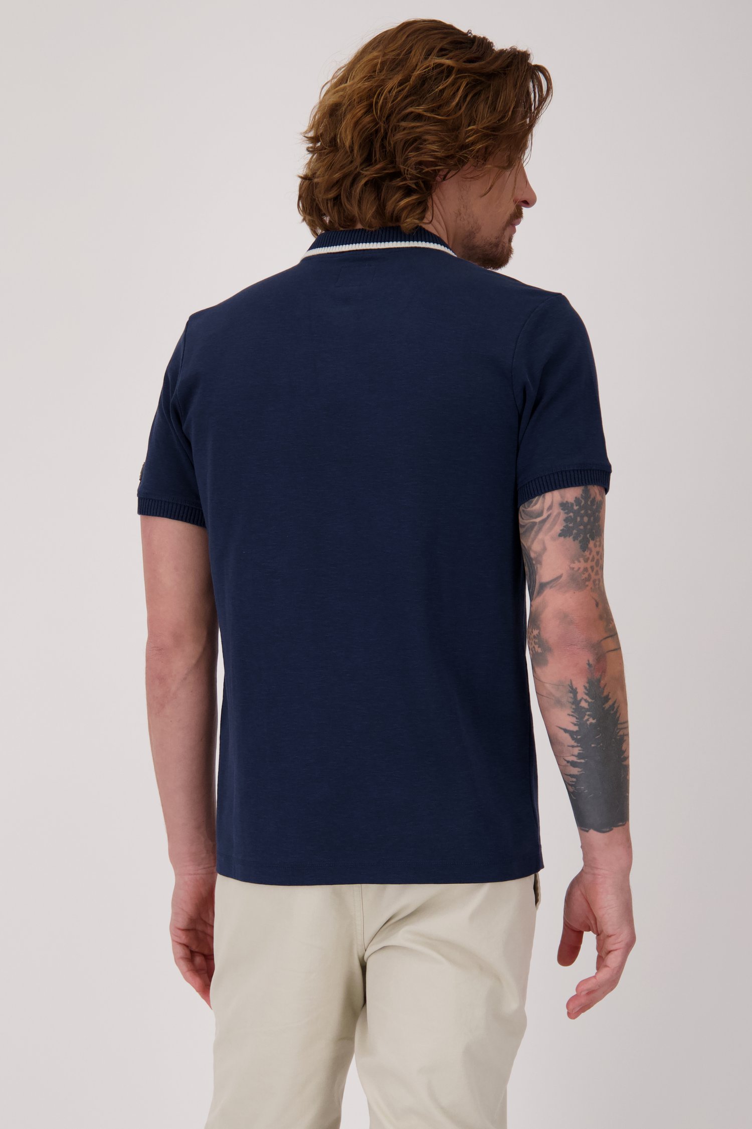 Polo bleu foncé à col blanc de Bluefields pour Hommes