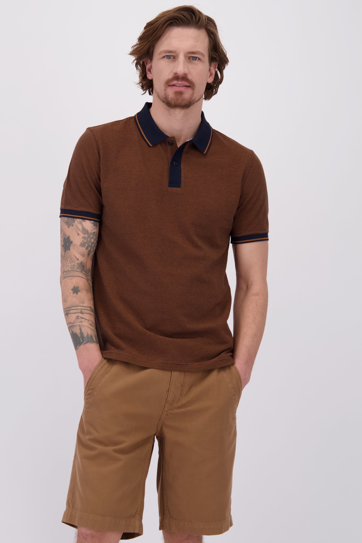 Le devant de Polo brun à manches courtes de Ravøtt pour Hommes