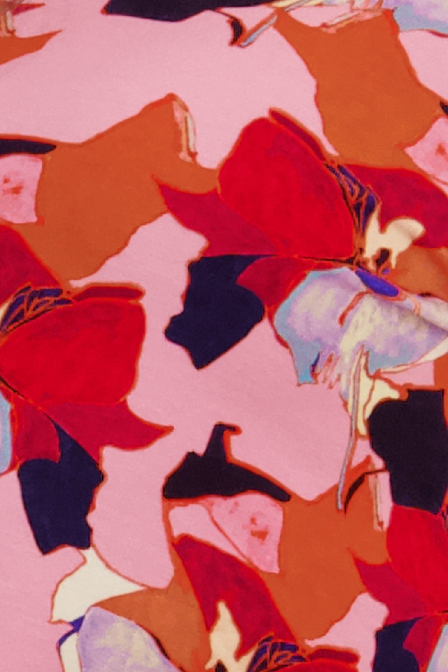 Polo rose à l'imprimé vif	 de Claude Arielle pour Femmes