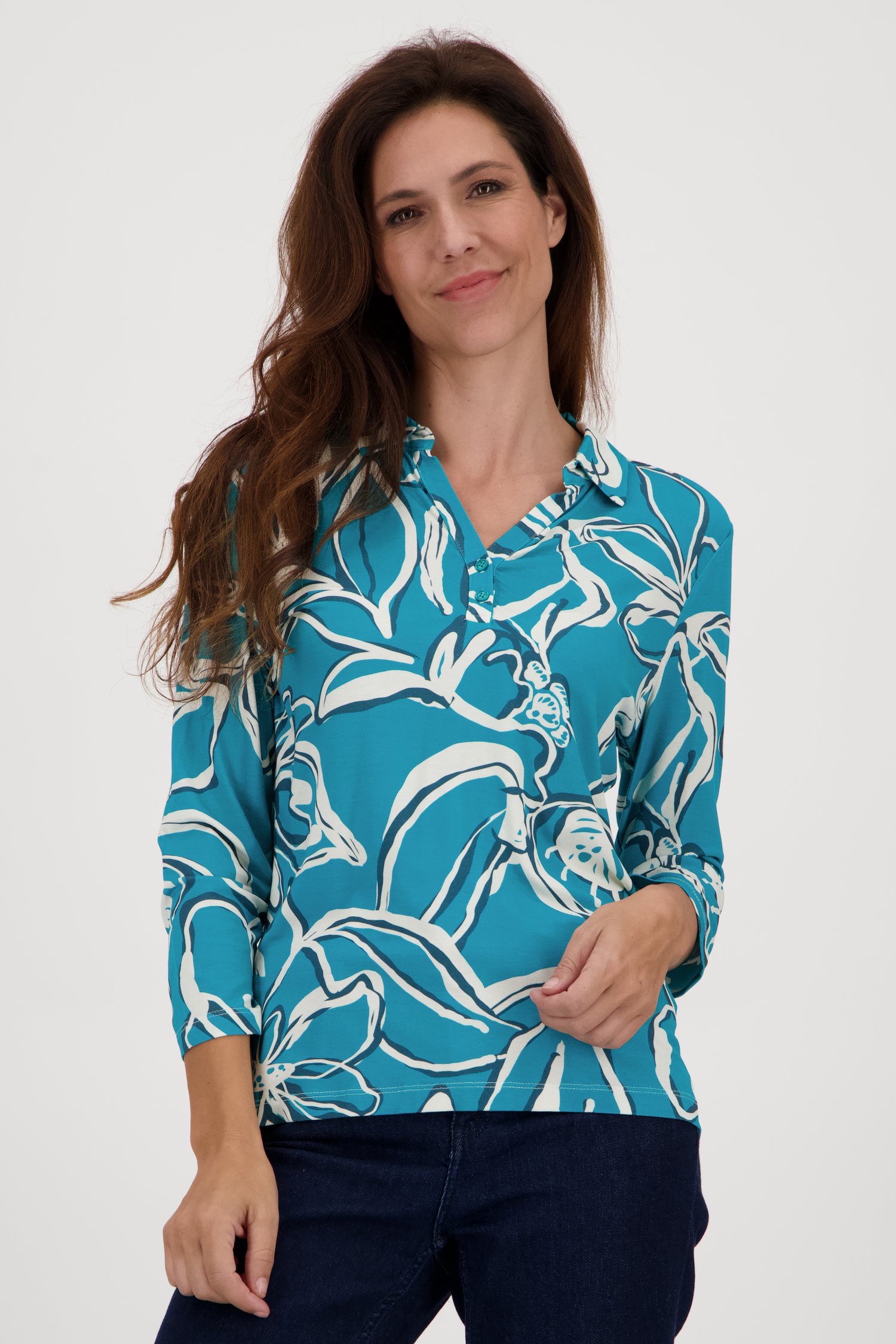 Polo turquoise avec imprimé écru de Claude Arielle pour Femmes