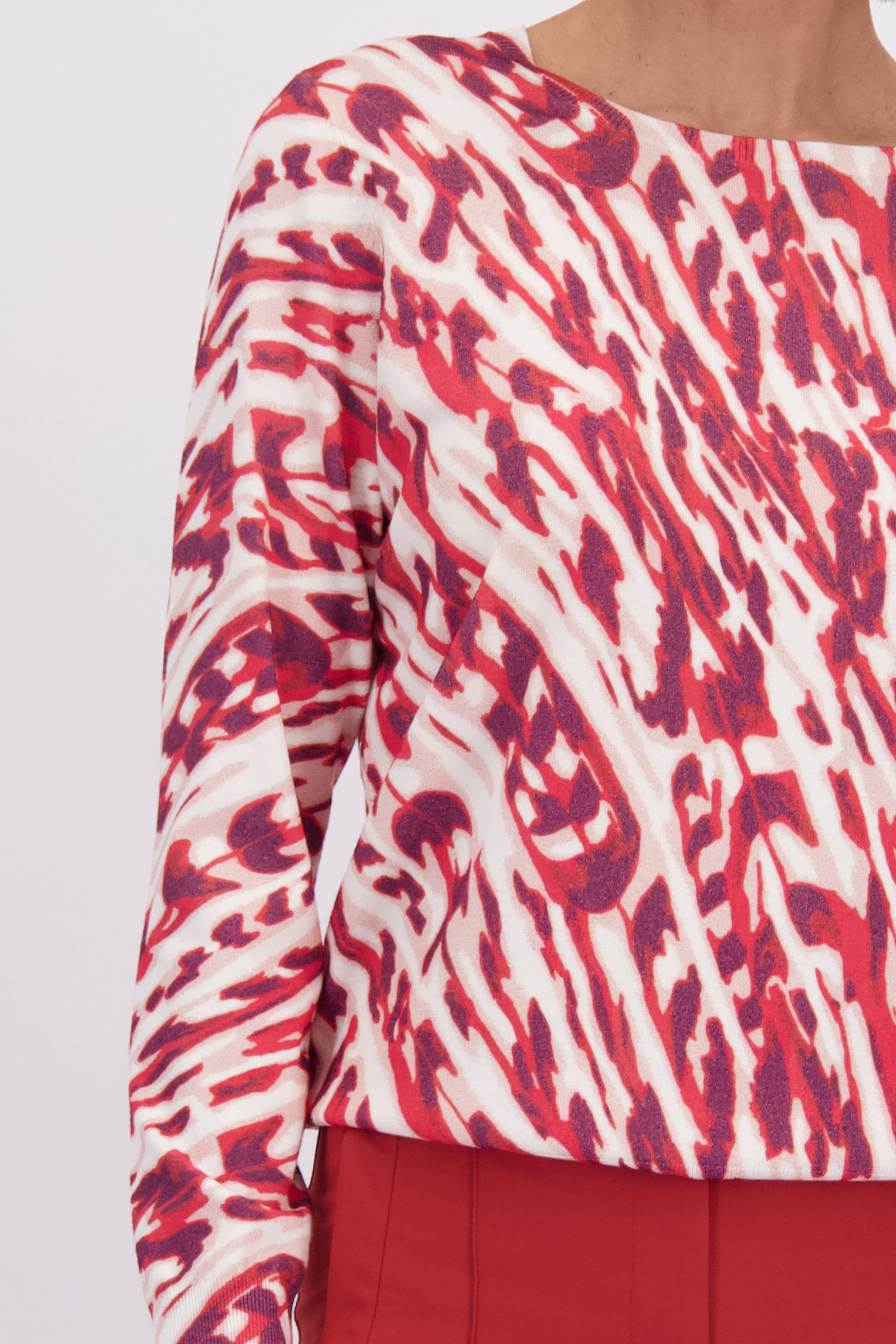 Détail de Pull finement tricoté à motif rouge et blanc de Claude Arielle pour Femmes