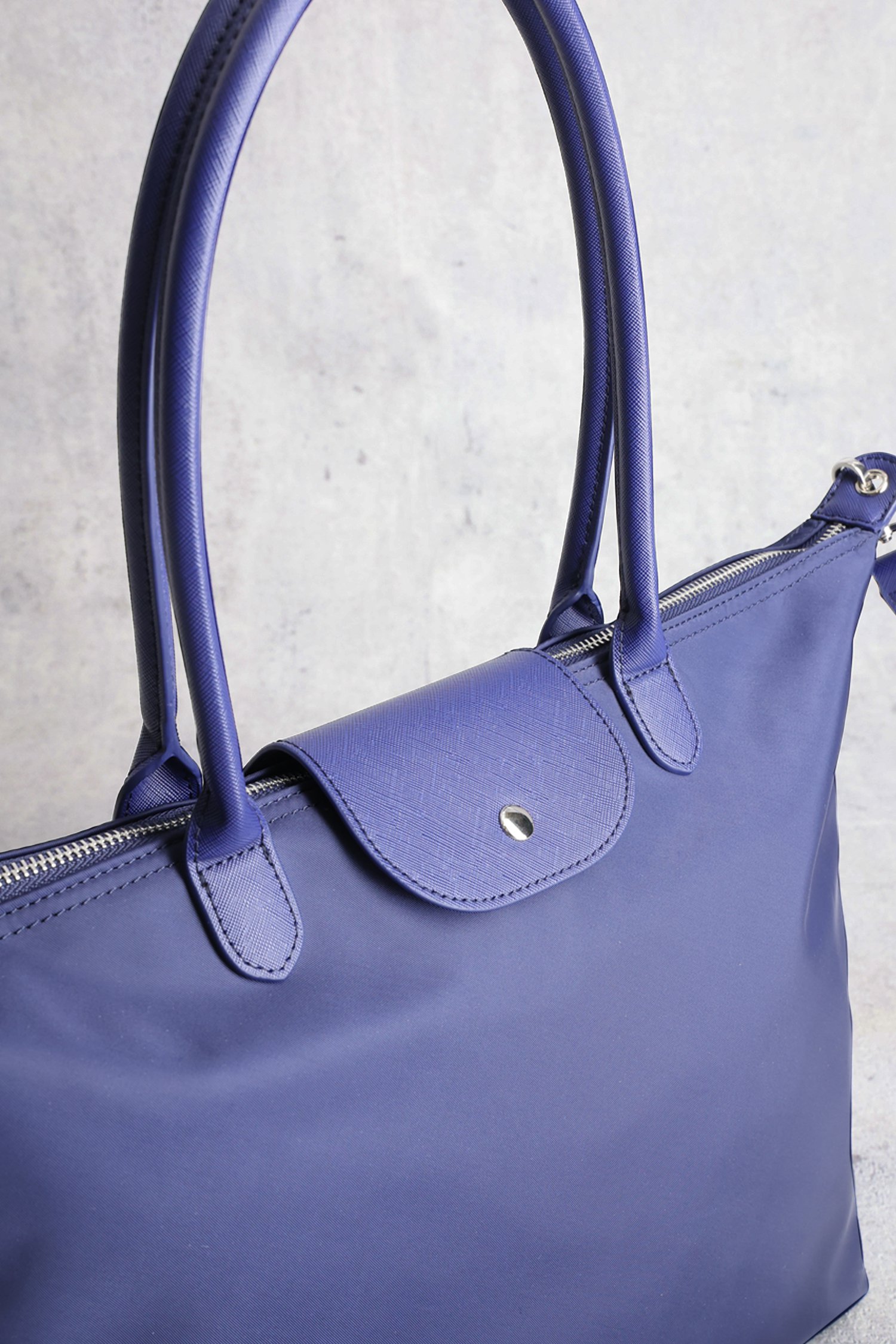 Sac à bandoulière bleu avec zip argenté de Liberty Island pour Femmes