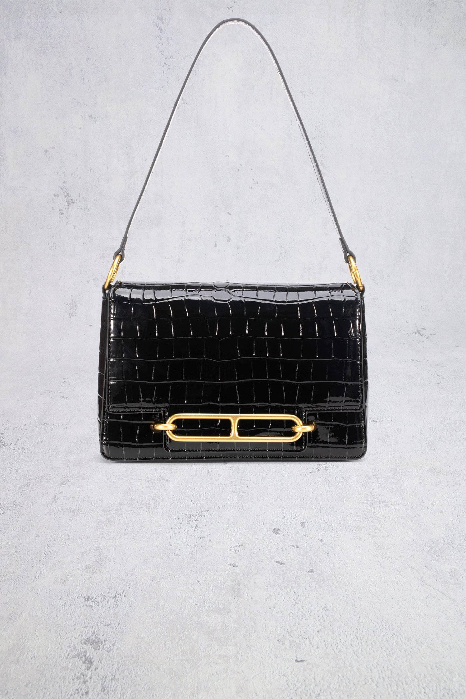 Le devant de Sac à main noir à structure crocodile de Laurent David pour Femmes