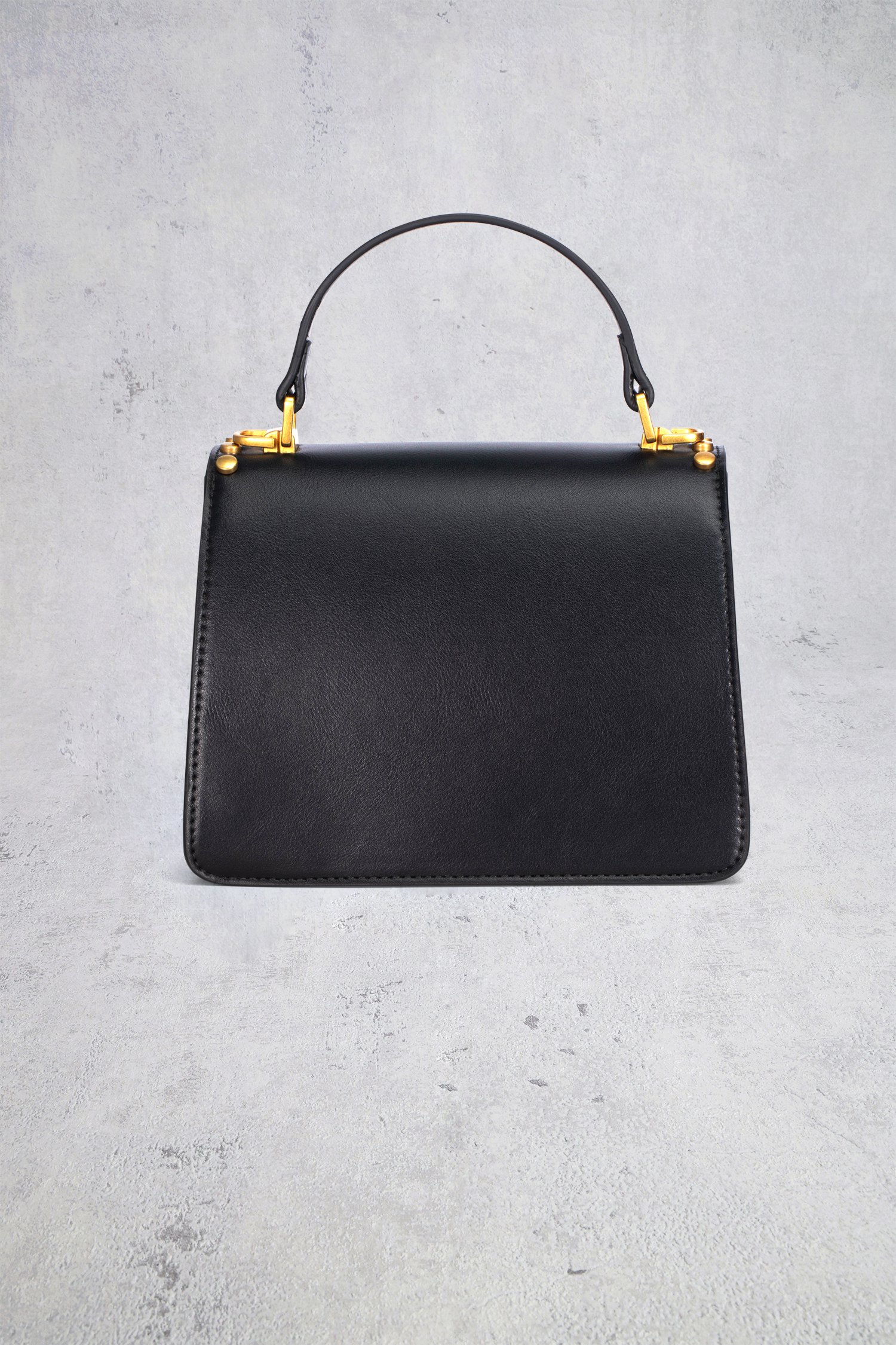 Le dos de Sac à main noir avec clous dorés de Laurent David pour Femmes