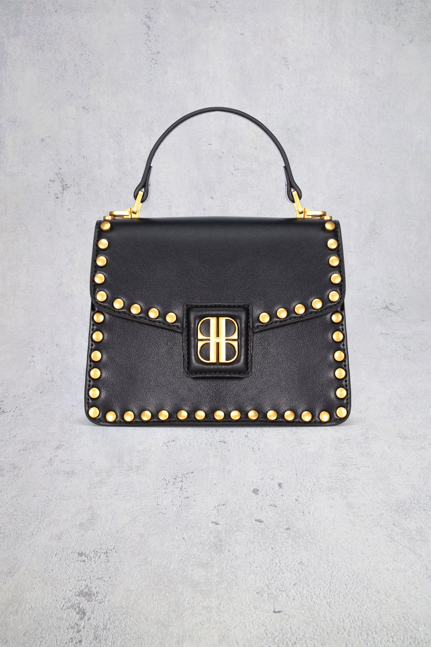 Le devant de Sac à main noir avec clous dorés de Laurent David pour Femmes