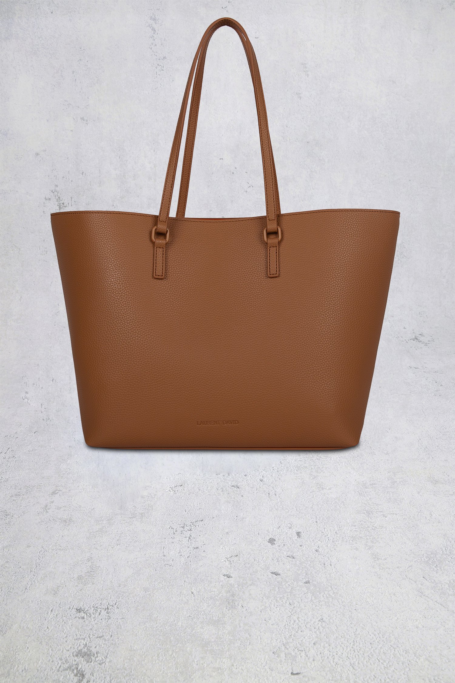 Le devant de Sac bandoulière cognac aspect cuir de Laurent David pour Femmes