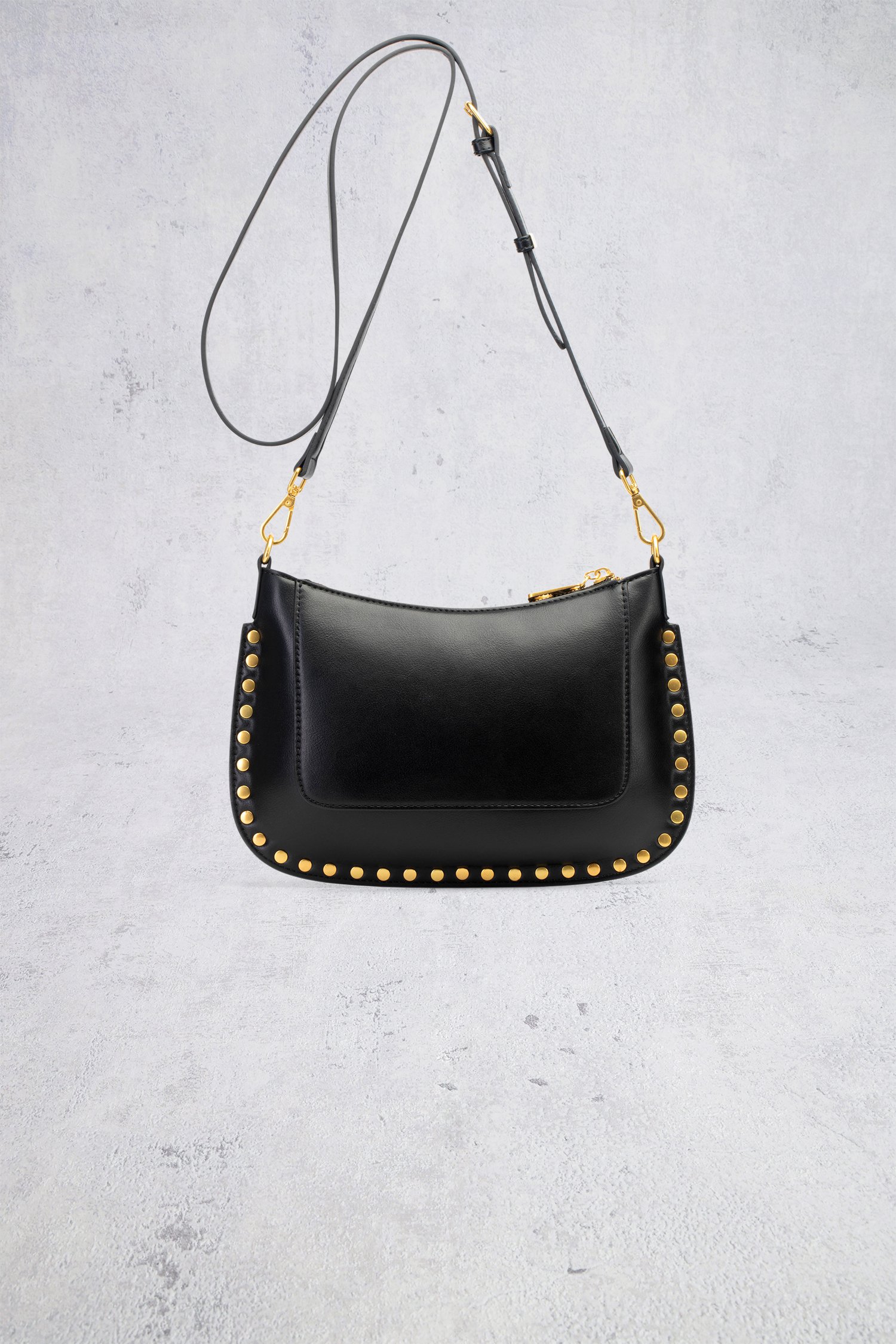 Le dos de Sac bandoulière noir à clous dorés de Laurent David pour Femmes