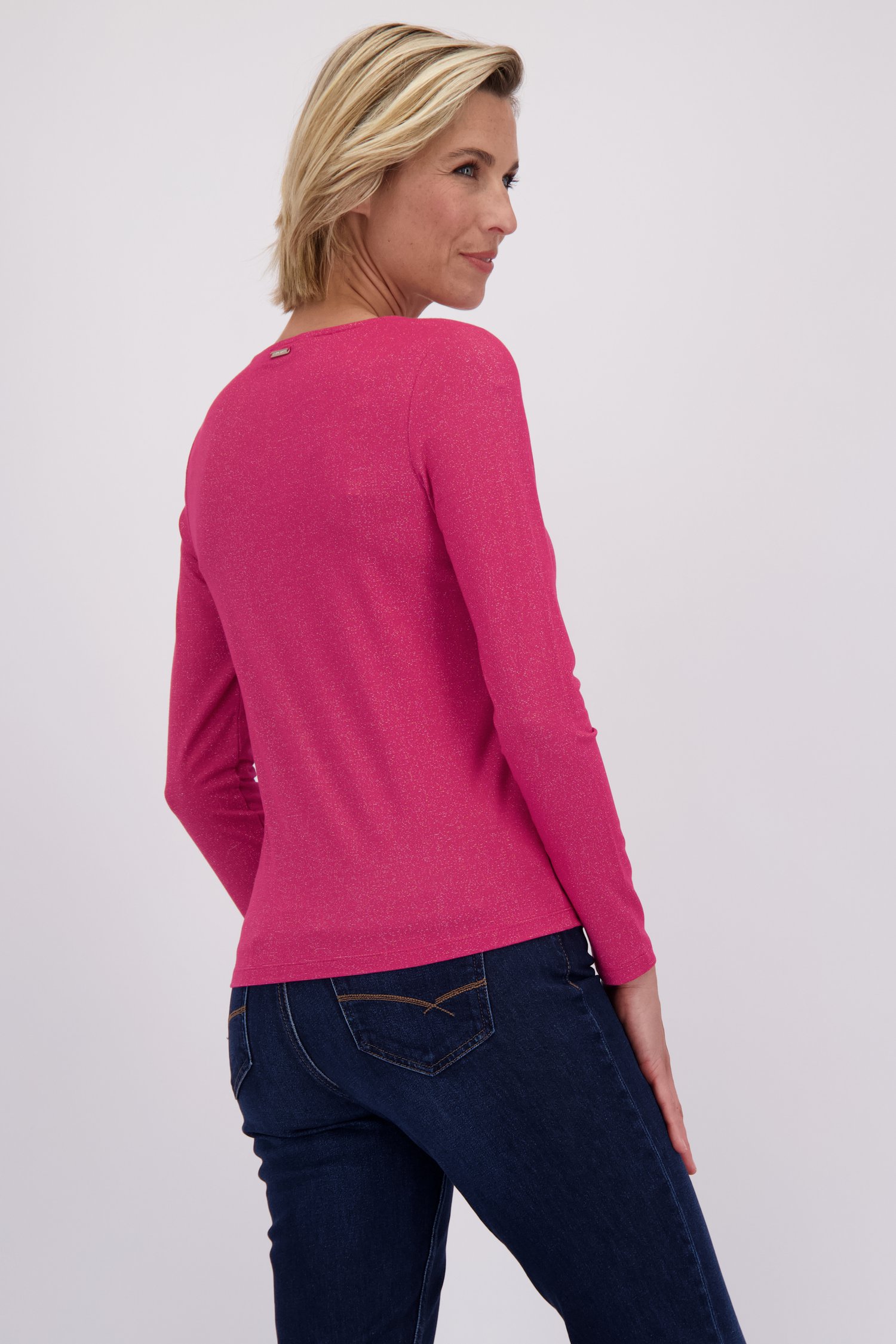 Le dos de T-shirt fuchsia à paillettes de Claude Arielle pour Femmes