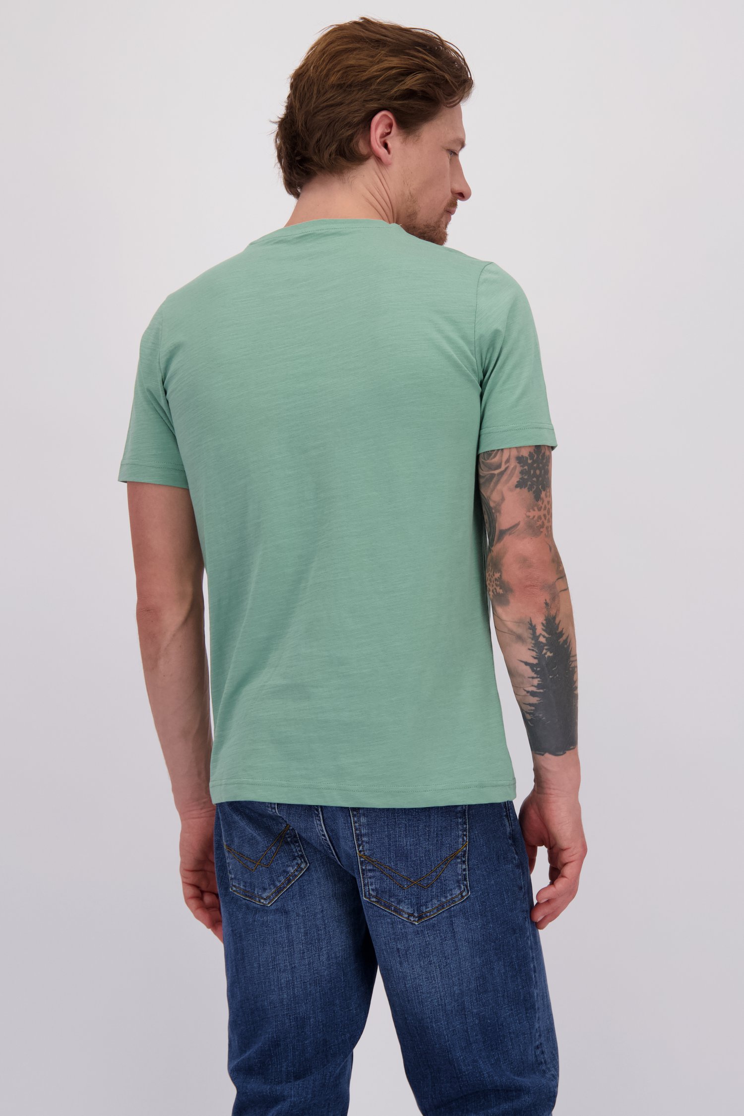 Le dos de T-shirt vert à col rond de Ravøtt pour Hommes