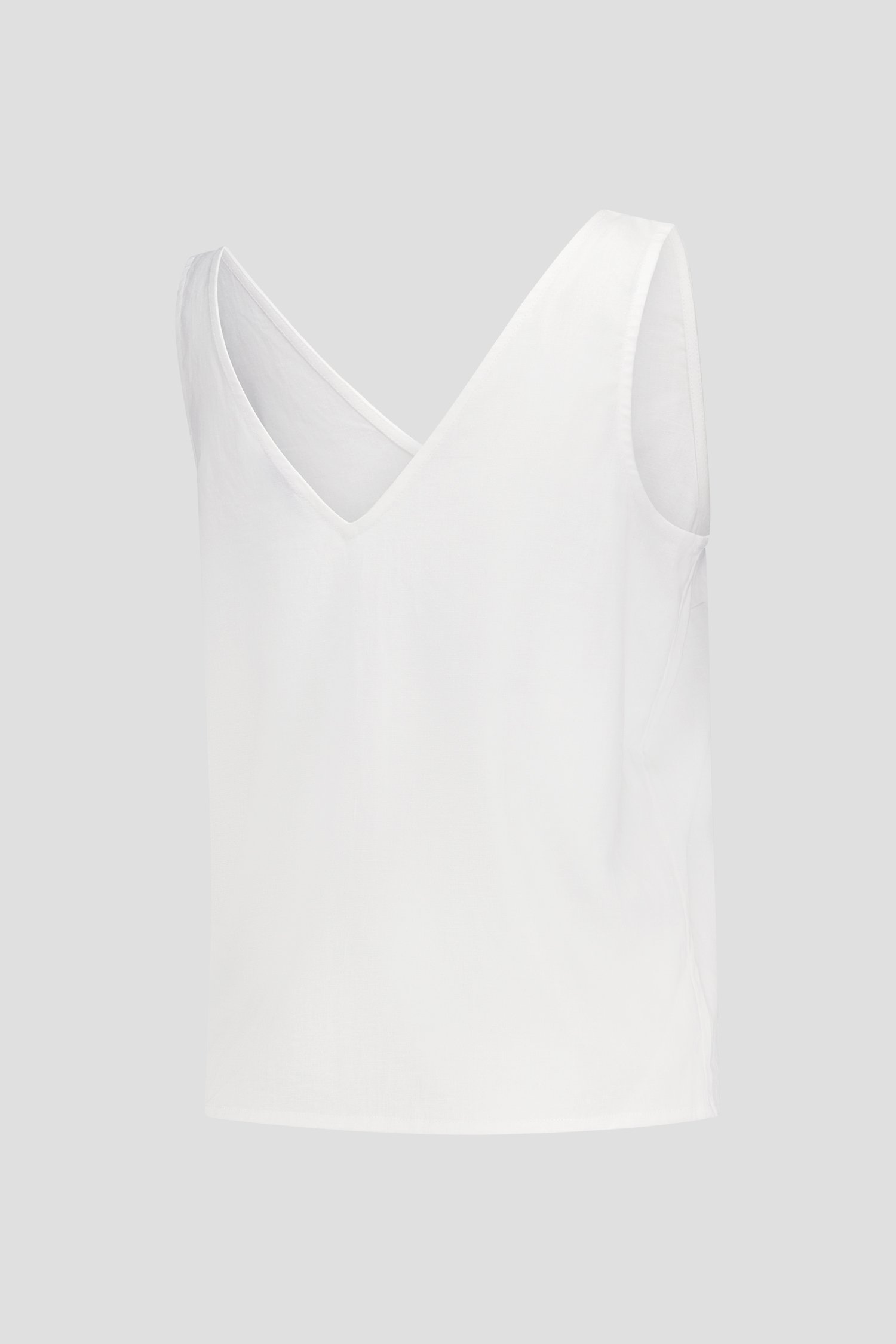 Top blanc sans manches avec col en V et dos ouvert de Liberty Island pour Femmes